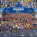 Coureurs au marathon de Madrid, participants enthousiastes sur le parcours.